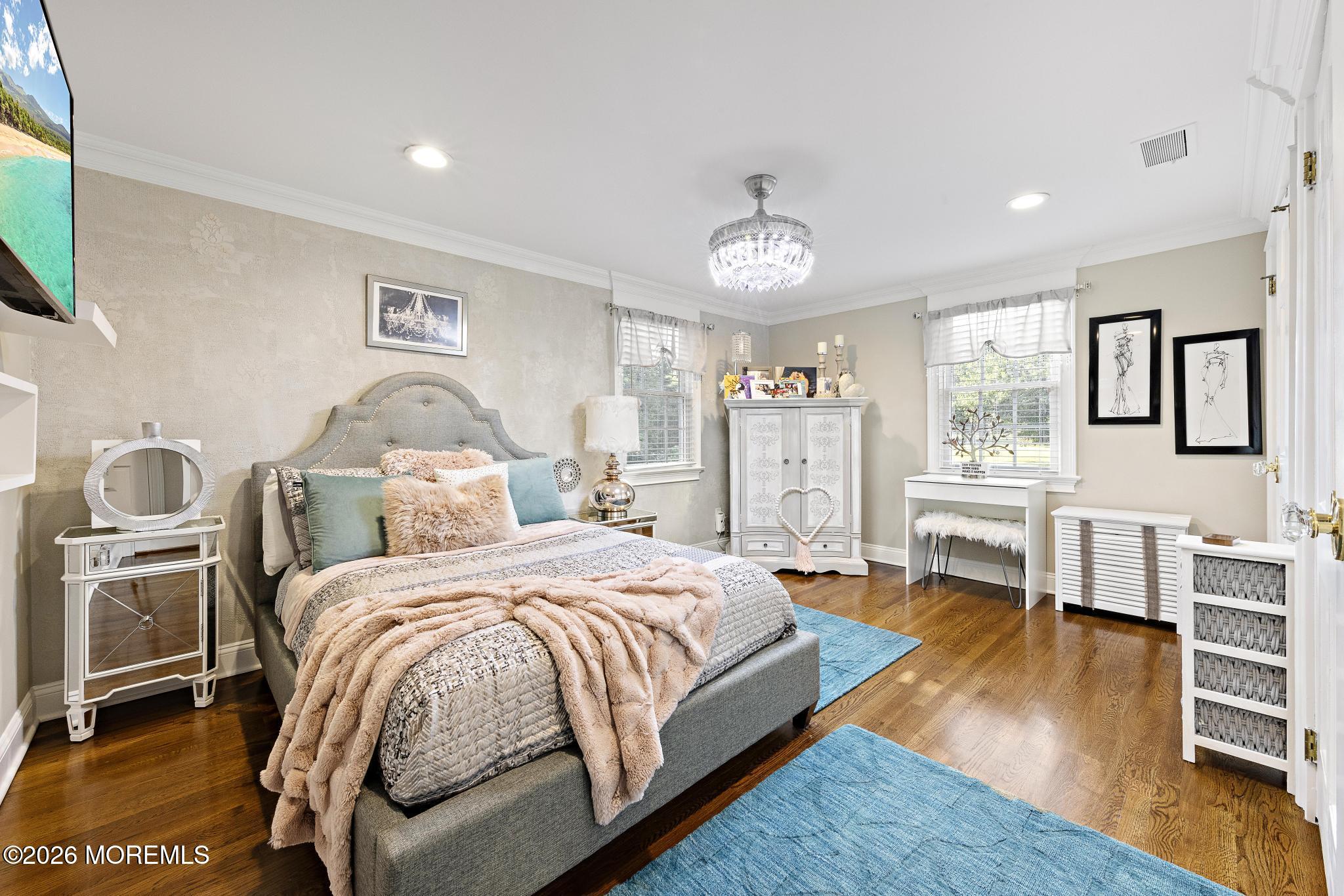 57 Beaver Dam Road Colts Neck, NJ 07722 - Photo 8 of 79 a bedroom with a bed and wooden floor