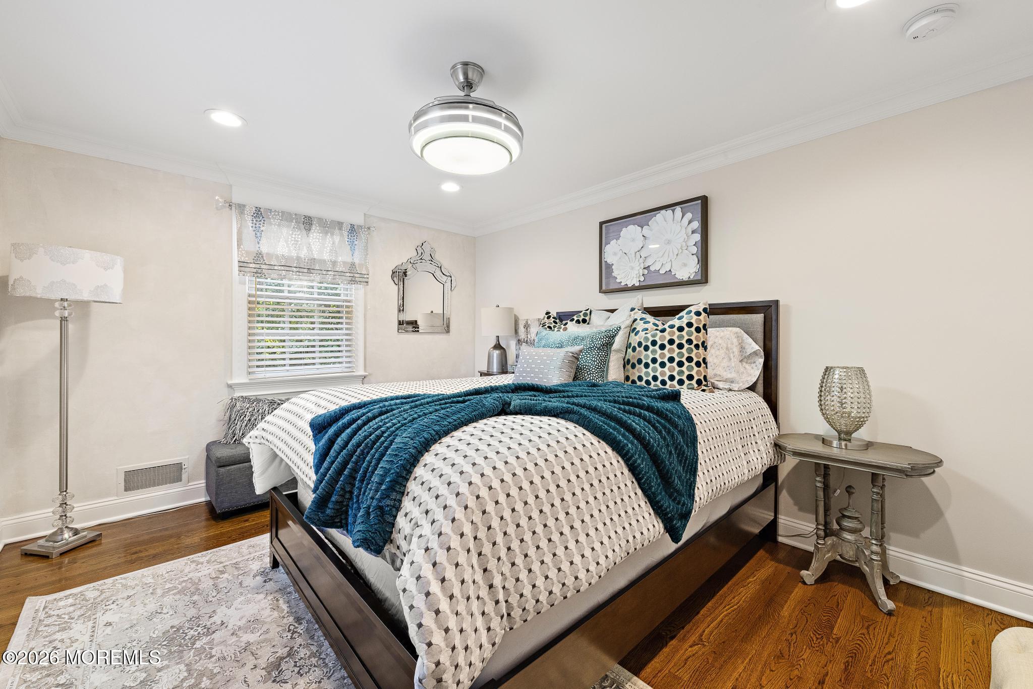 57 Beaver Dam Road Colts Neck, NJ 07722 - Photo 9 of 79 a bedroom with a bed and wooden floor