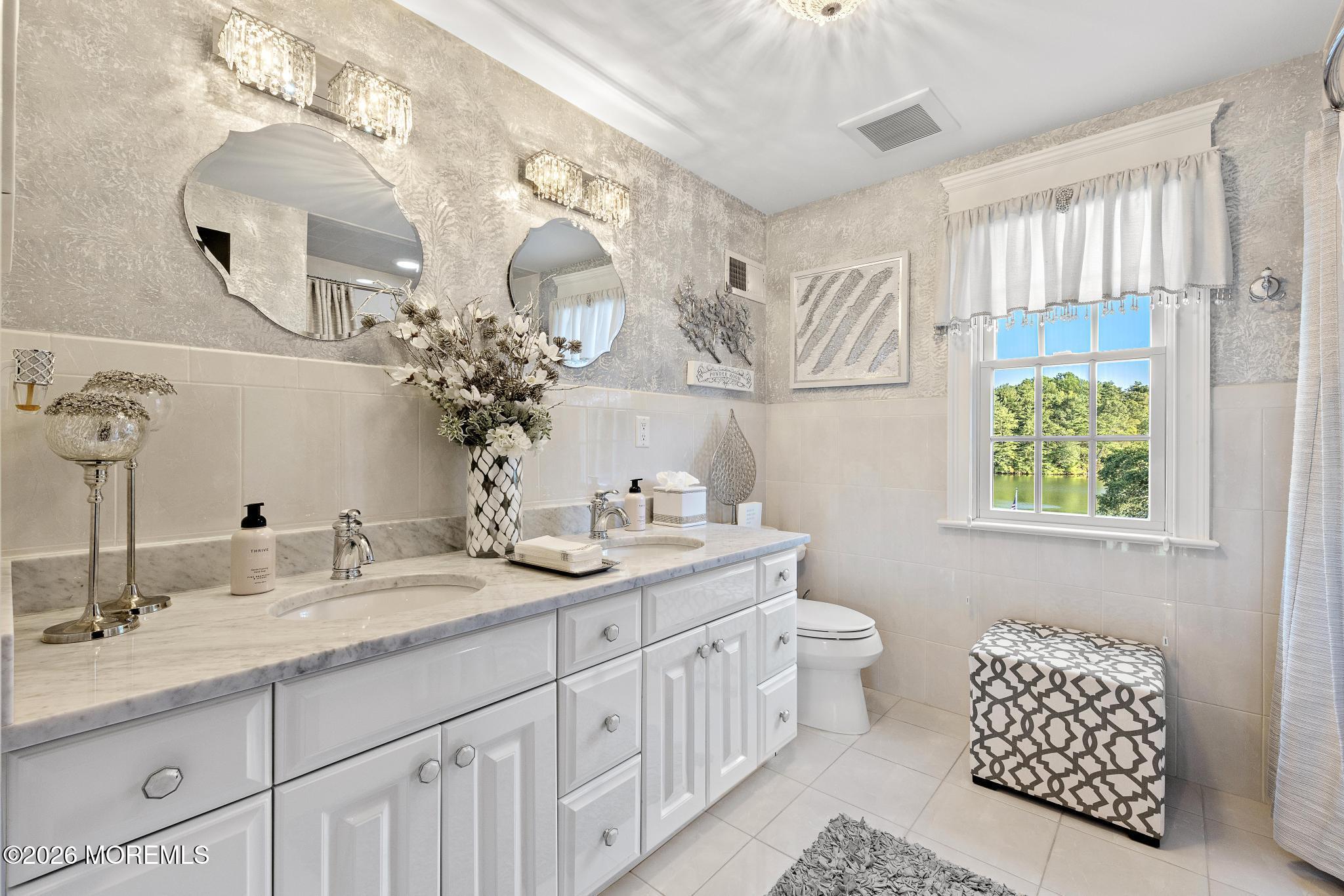 57 Beaver Dam Road Colts Neck, NJ 07722 - Photo 10 of 79 a bathroom with a double vanity sink mirror and toilet