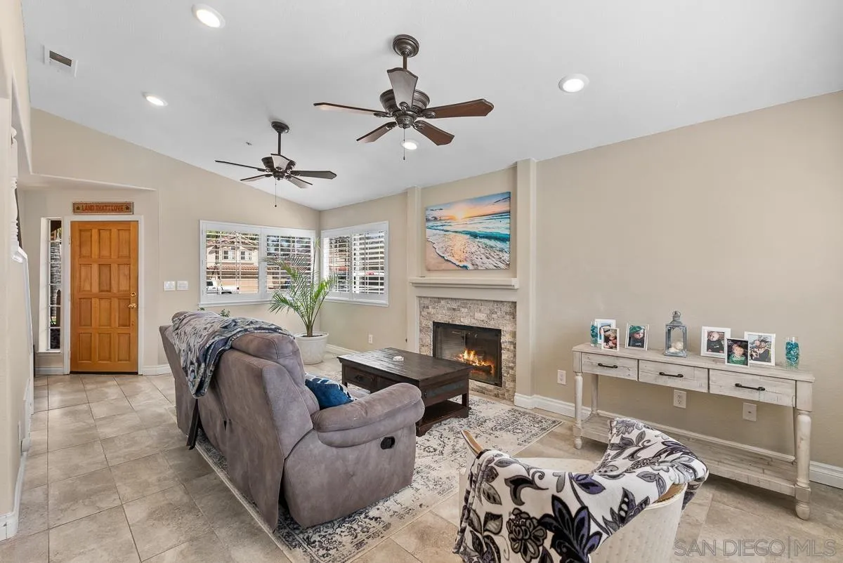 10109 Country Scenes Court Santee, CA 92071 - Photo 17 of 43 a living room with furniture and a fireplace