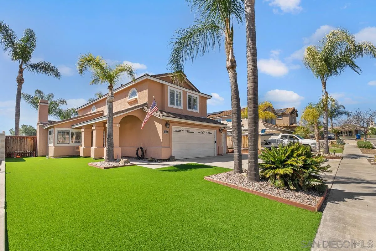 10109 Country Scenes Court Santee, CA 92071 - Photo 2 of 43 a front view of a house with a garden
