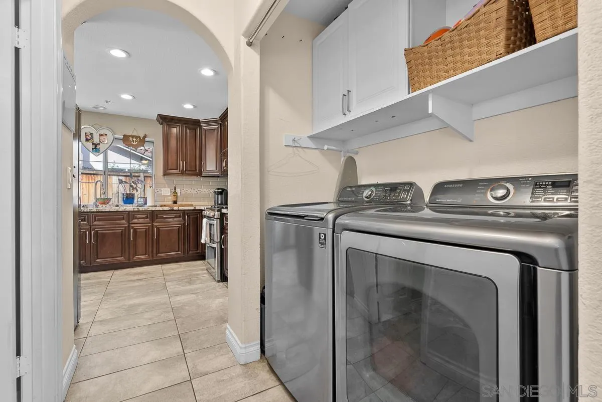 10109 Country Scenes Court Santee, CA 92071 - Photo 23 of 43 a utility room with washer and dryer