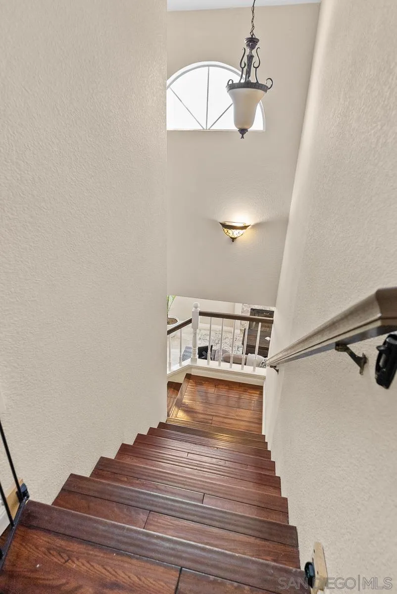 10109 Country Scenes Court Santee, CA 92071 - Photo 25 of 43 a view of a room with wooden floor and staircase