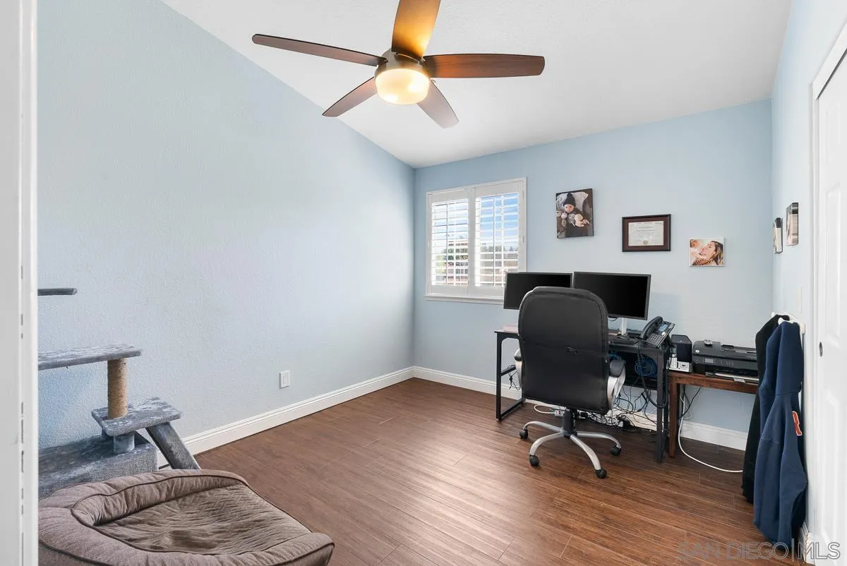 10109 Country Scenes Court Santee, CA 92071 - Photo 33 of 43 a view of workspace with wooden floor windows