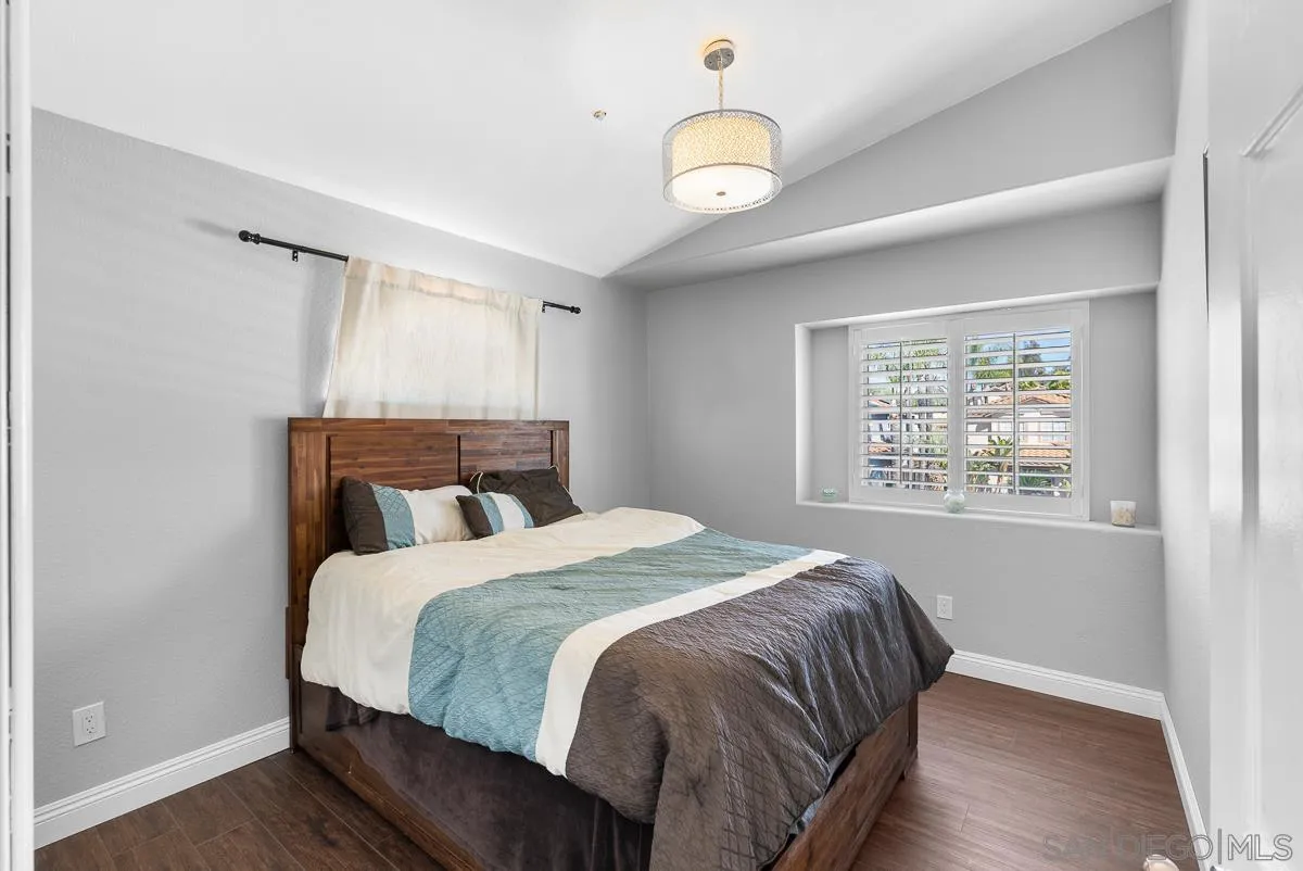 10109 Country Scenes Court Santee, CA 92071 - Photo 34 of 43 a bedroom with a large bed and a window
