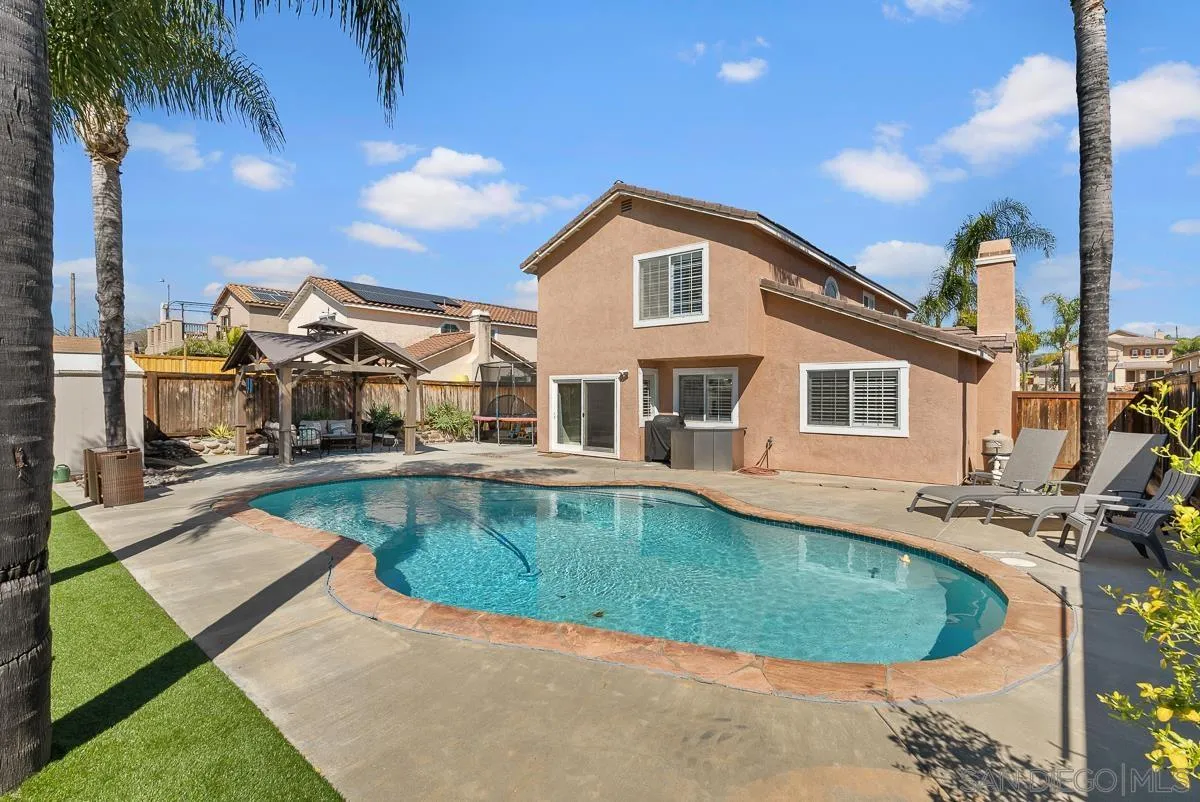 10109 Country Scenes Court Santee, CA 92071 - Photo 36 of 43 a view of a house with swimming pool and sitting area