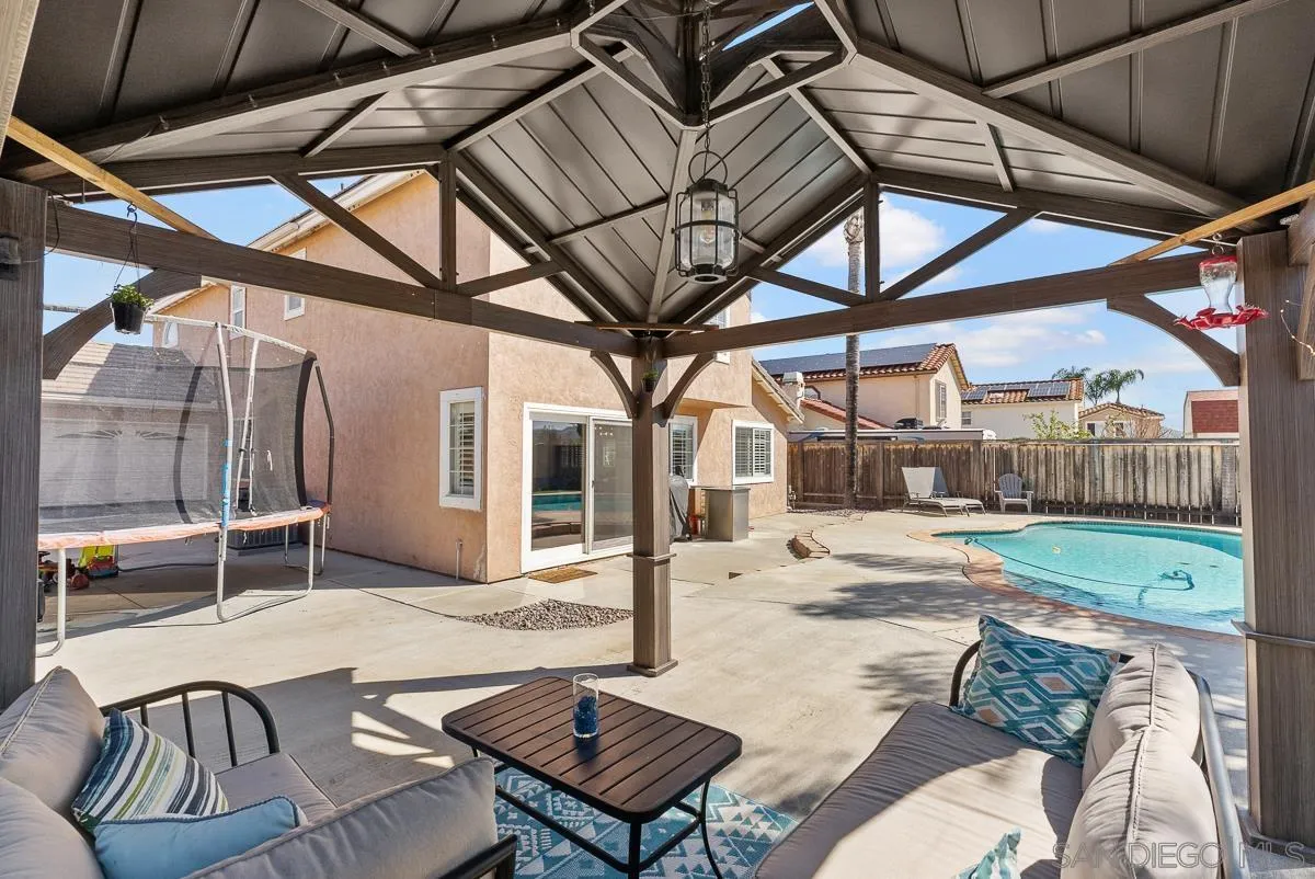 10109 Country Scenes Court Santee, CA 92071 - Photo 40 of 43 a backyard of a house with outdoor seating