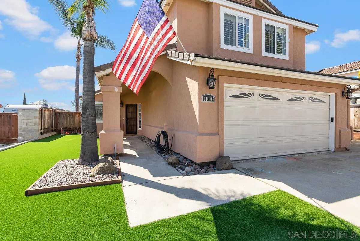 10109 Country Scenes Court Santee, CA 92071 - Photo 5 of 43 a front view of a house with a yard