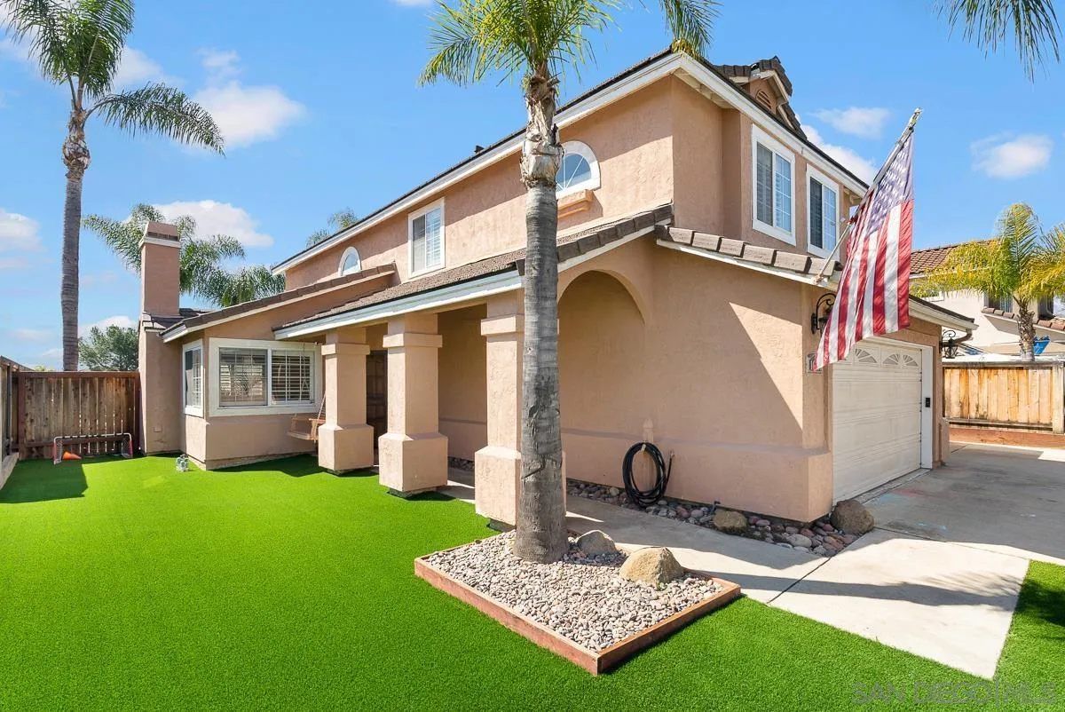 10109 Country Scenes Court Santee, CA 92071 - Photo 6 of 43 a view of a house with a yard porch and a patio