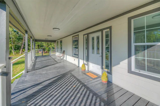 a view of swimming pool with seating area