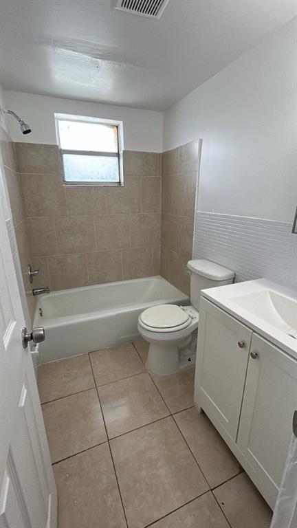 2245 Madison Street Hollywood, FL 33020 - Photo 2 of 6 a bathroom with a sink a toilet and shower