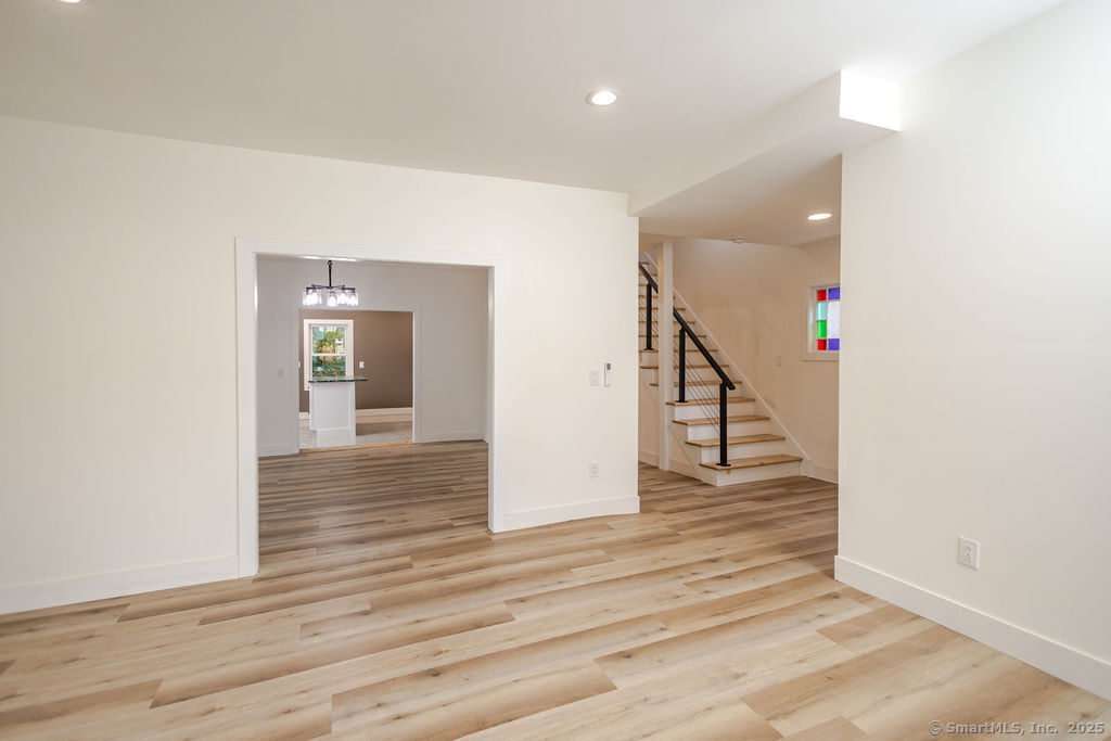 7 Florence Street Putnam, CT 06260 - Photo 22 of 38 wooden floor in an empty room with wooden floor