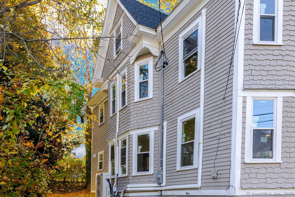 7 Florence Street Putnam, CT 06260 - Photo 7 of 38 a view of a building with a tree