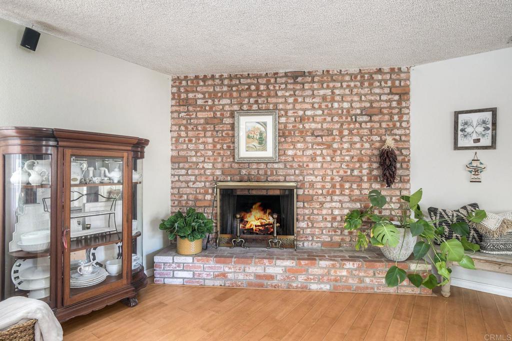 554 Taylor Street Vista, CA 92084 - Photo 12 of 51 a living room with a fireplace