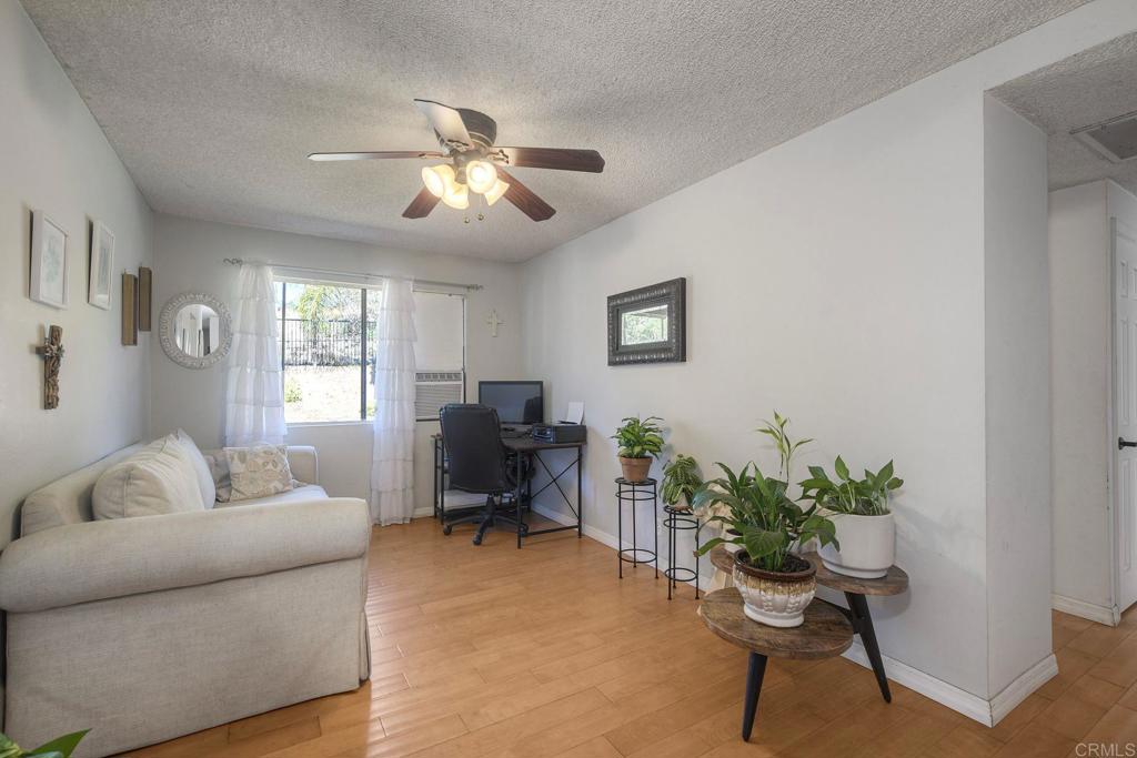 554 Taylor Street Vista, CA 92084 - Photo 21 of 51 a living room with furniture and a potted plant