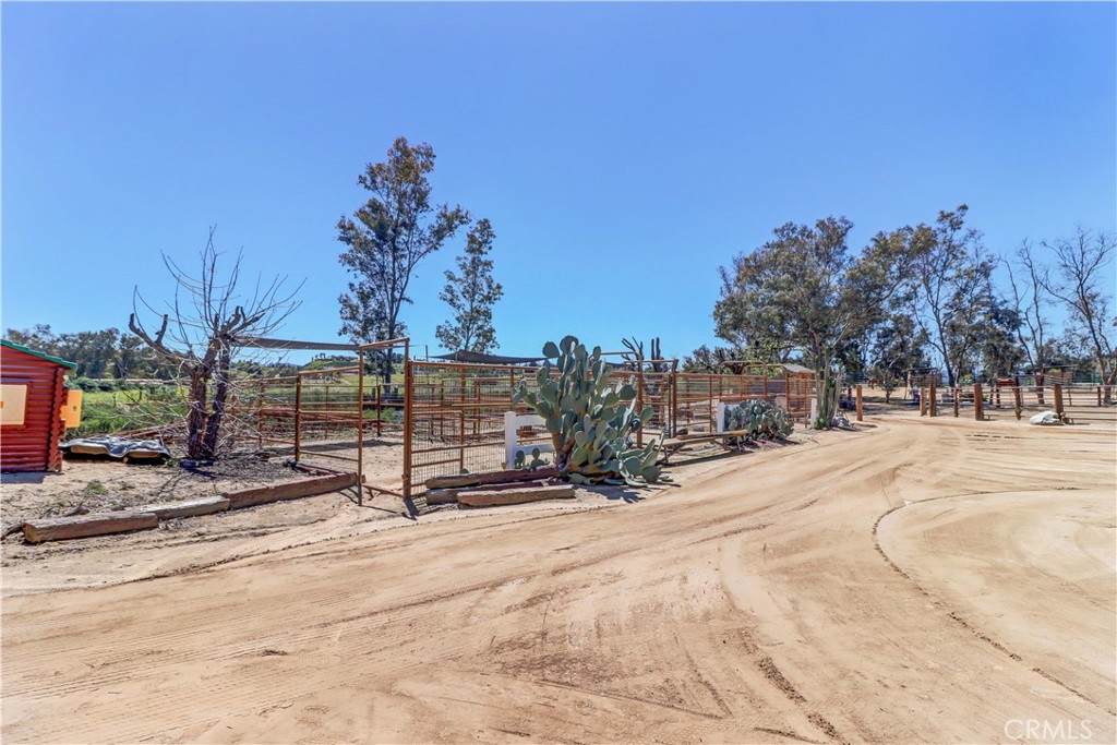 31895 Nicolas Road Temecula, CA 92591 - Photo 24 of 37 a view of a park with a building in the background
