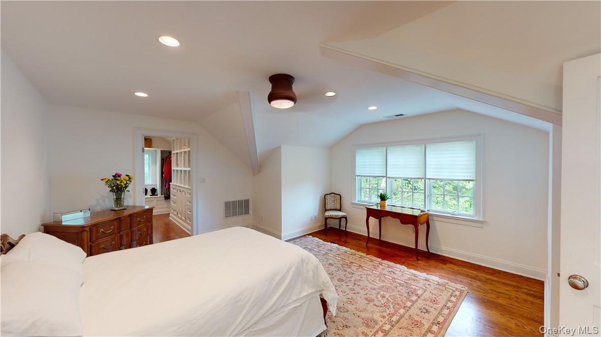 225 South Barry Avenue, Unit RENT Mamaroneck, NY 10543 - Photo 13 of 26 a bedroom with a bed and a large window