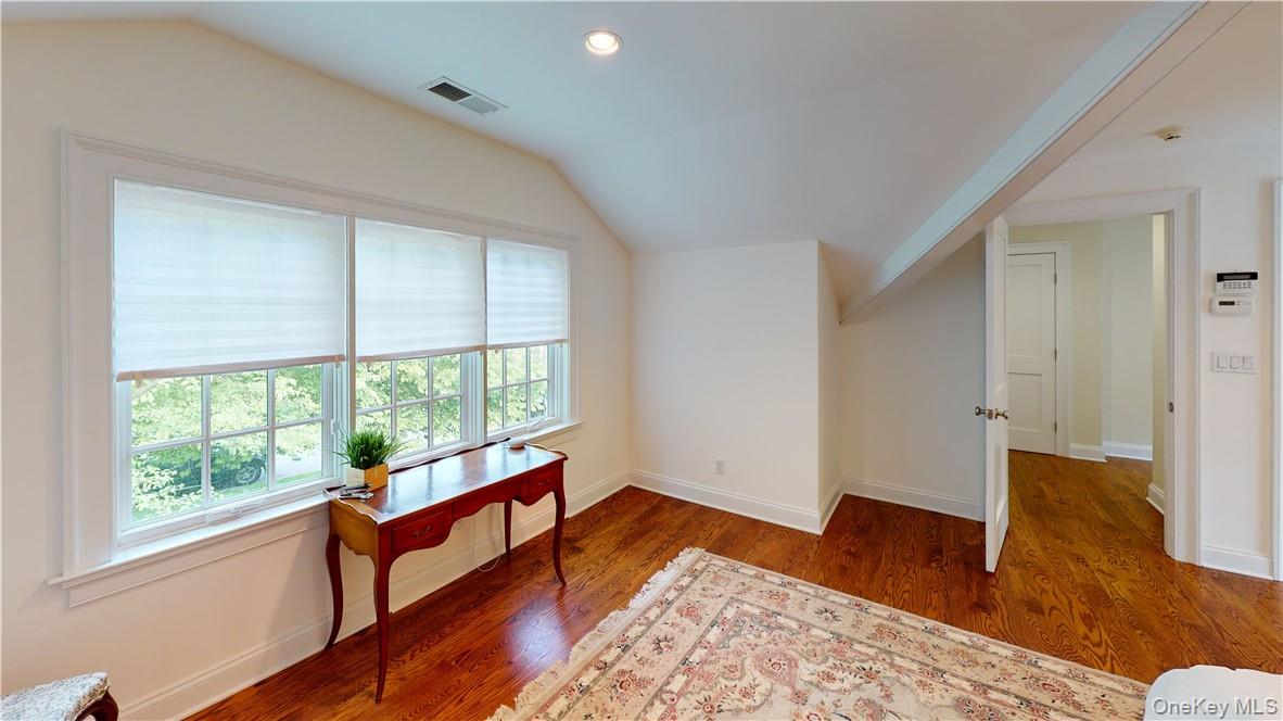 225 South Barry Avenue, Unit RENT Mamaroneck, NY 10543 - Photo 14 of 26 a living room with wooden floor and a window