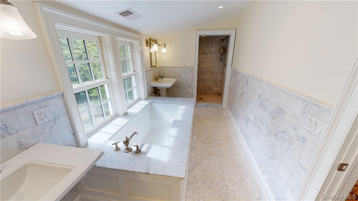 225 South Barry Avenue, Unit RENT Mamaroneck, NY 10543 - Photo 16 of 26 a hallway with furniture and wooden floor