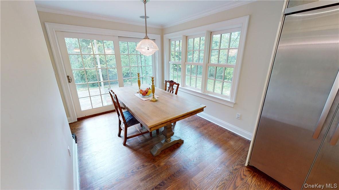 225 South Barry Avenue, Unit RENT Mamaroneck, NY 10543 - Photo 10 of 26 a view of a room with wooden floor and windows