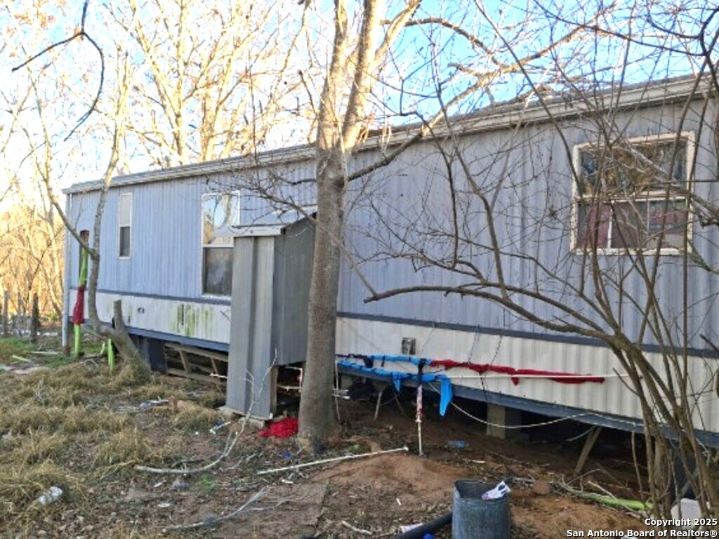 615 Viewpoint Drive Poteet, TX 78065 - Photo 8 of 9 a view of a house with a patio