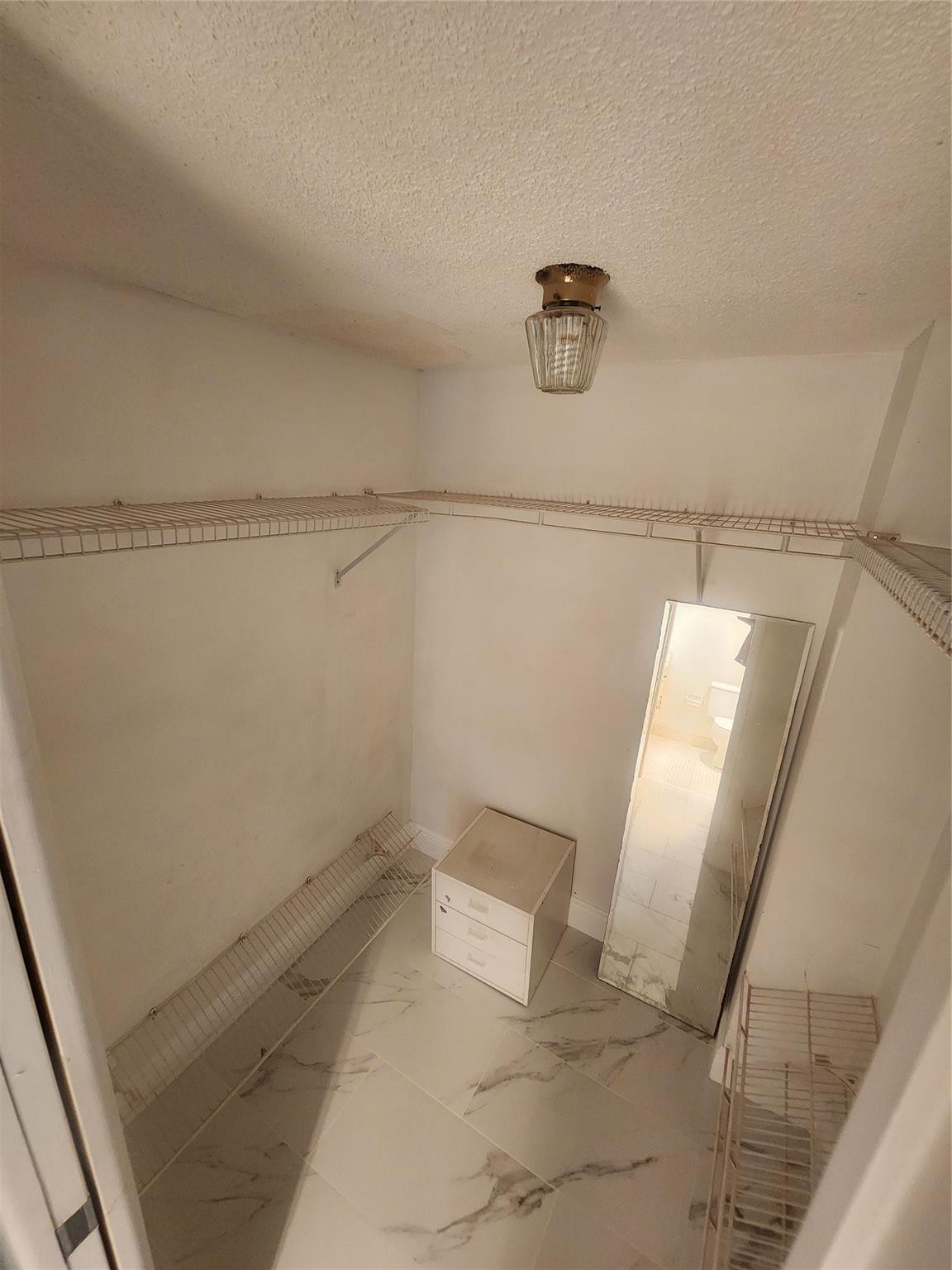 3051 North Course Drive Pompano Beach, FL 33069 - Photo 6 of 13 a view of a garage