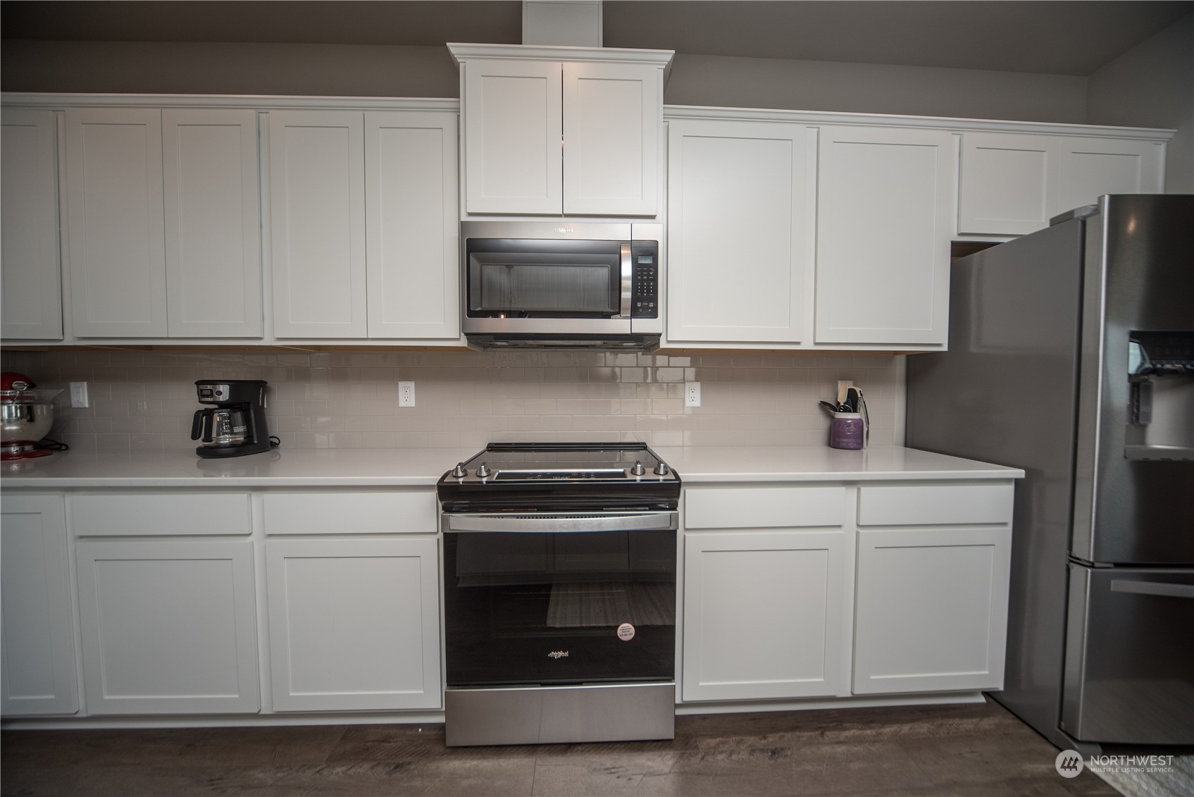 570 Green Canyon Road Ellensburg, WA 98926 - Photo 11 of 34 a kitchen with cabinets stainless steel appliances and a sink