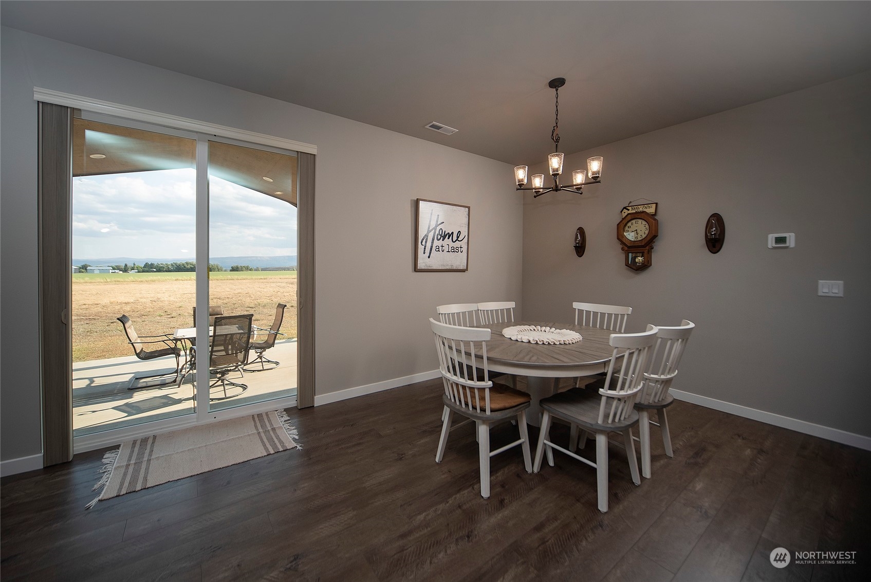 570 Green Canyon Road Ellensburg, WA 98926 - Photo 14 of 34 a view of a dining room with furniture window and wooden floor