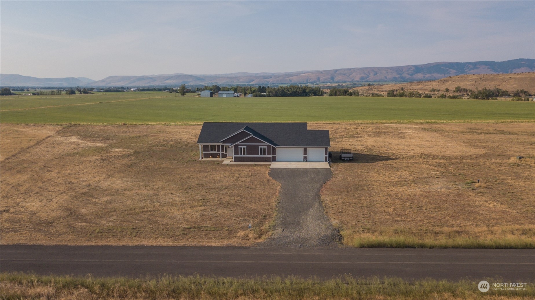 570 Green Canyon Road Ellensburg, WA 98926 - Photo 2 of 34 a view of a lake with a mountain in the background