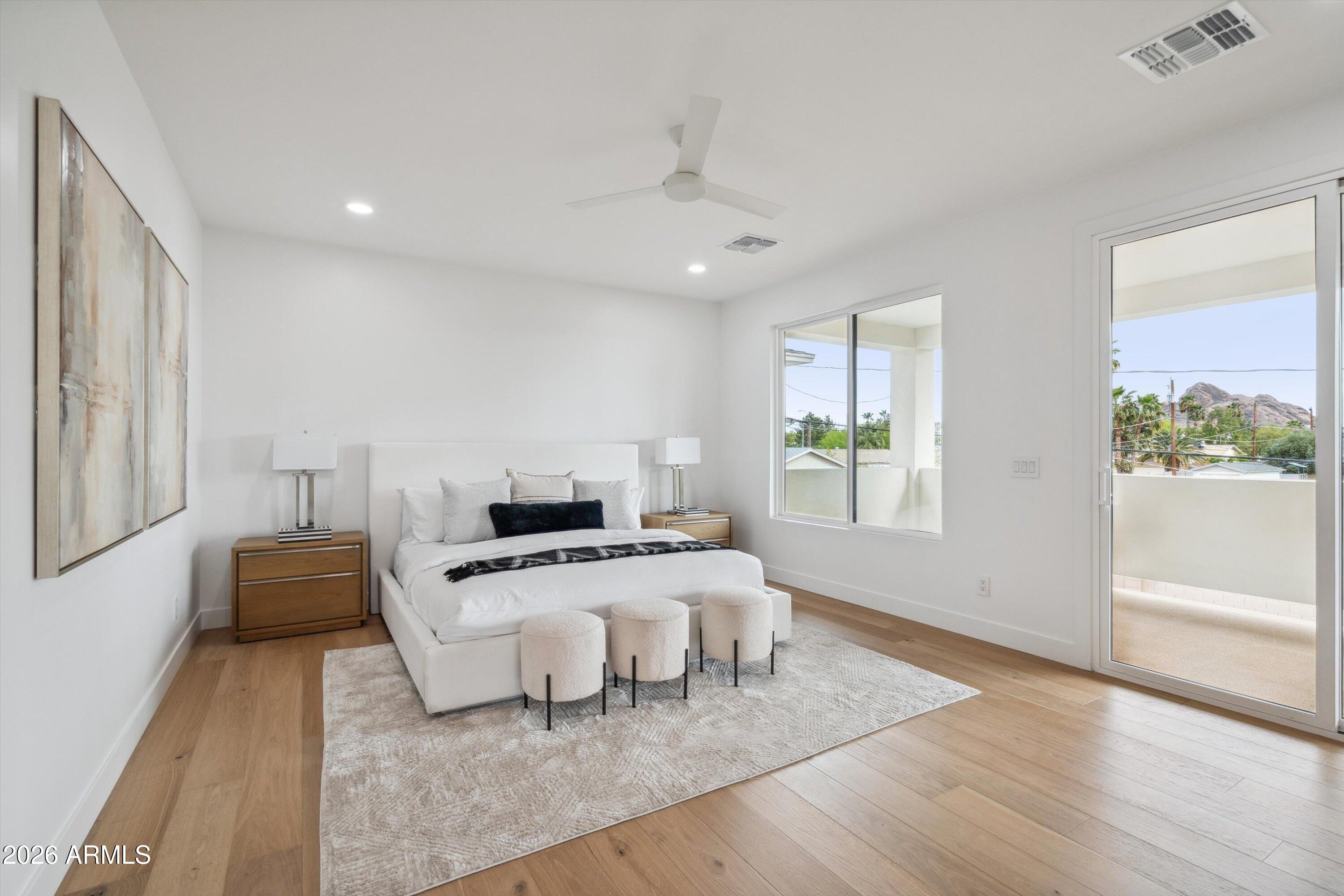 5533 East Earll Drive Phoenix, AZ 85018 - Photo 25 of 42 a living room with furniture and a window