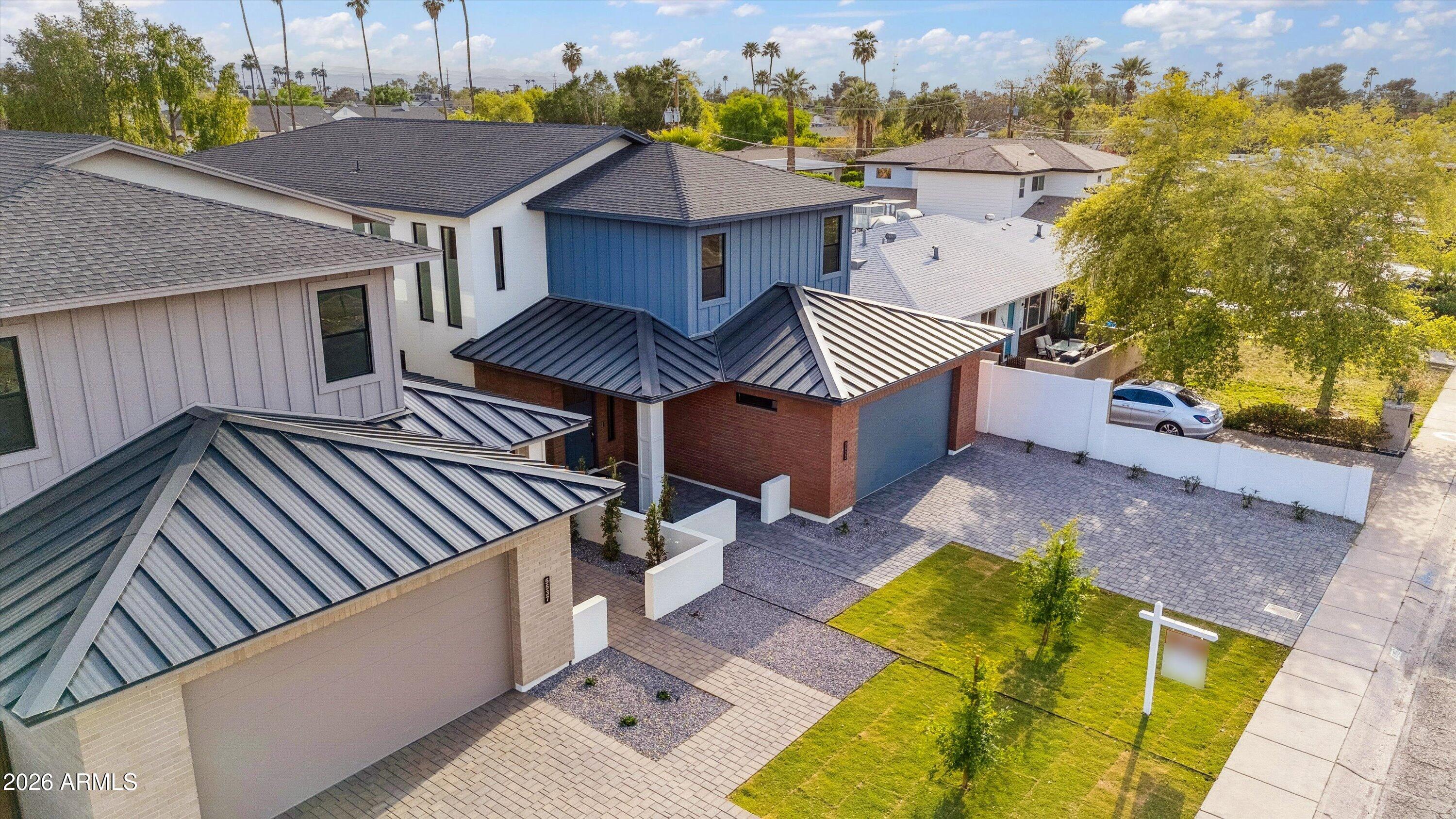 5533 East Earll Drive Phoenix, AZ 85018 - Photo 3 of 42 an aerial view of a house with swimming pool and porch