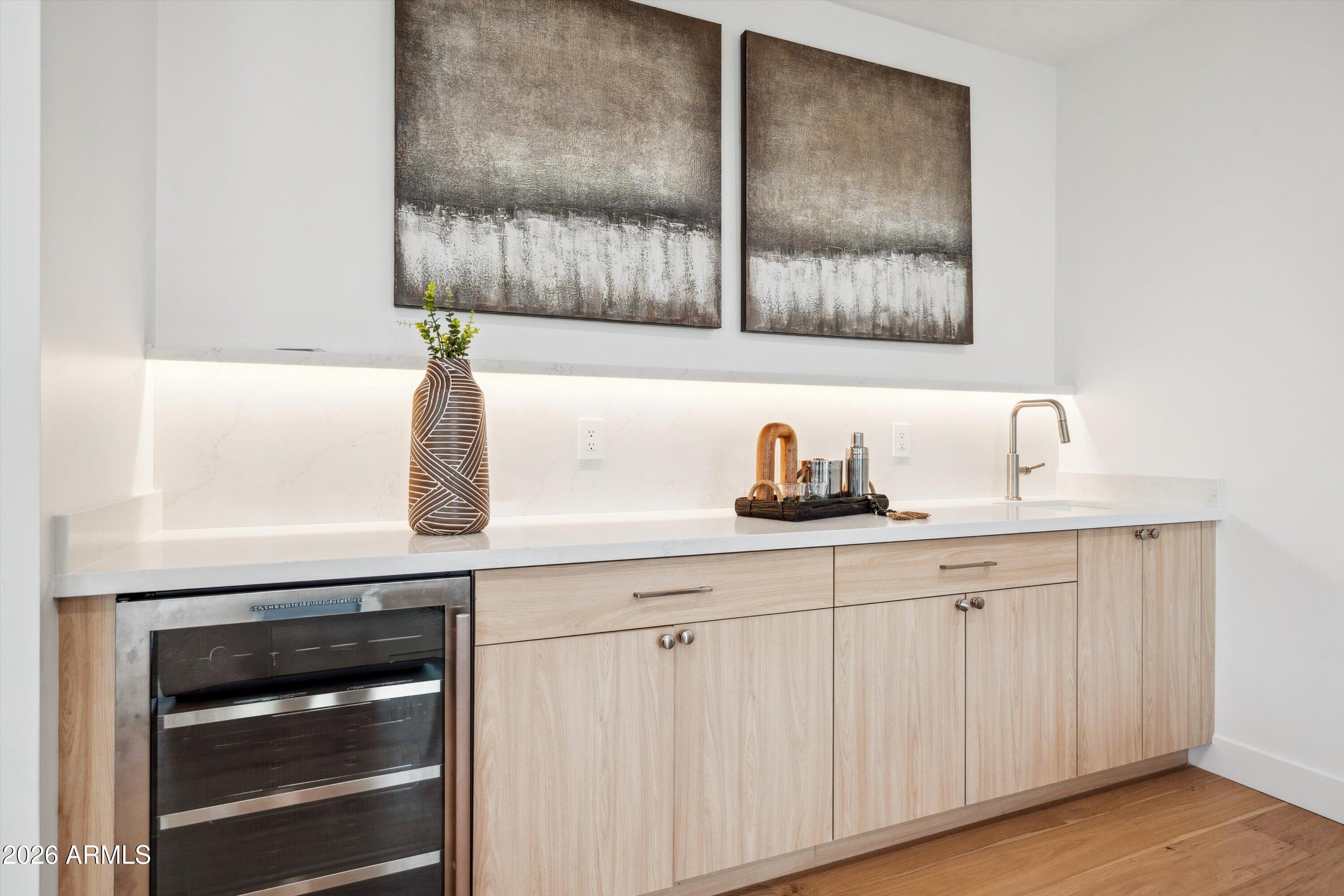 5533 East Earll Drive Phoenix, AZ 85018 - Photo 7 of 42 a bathroom with a sink and a mirror