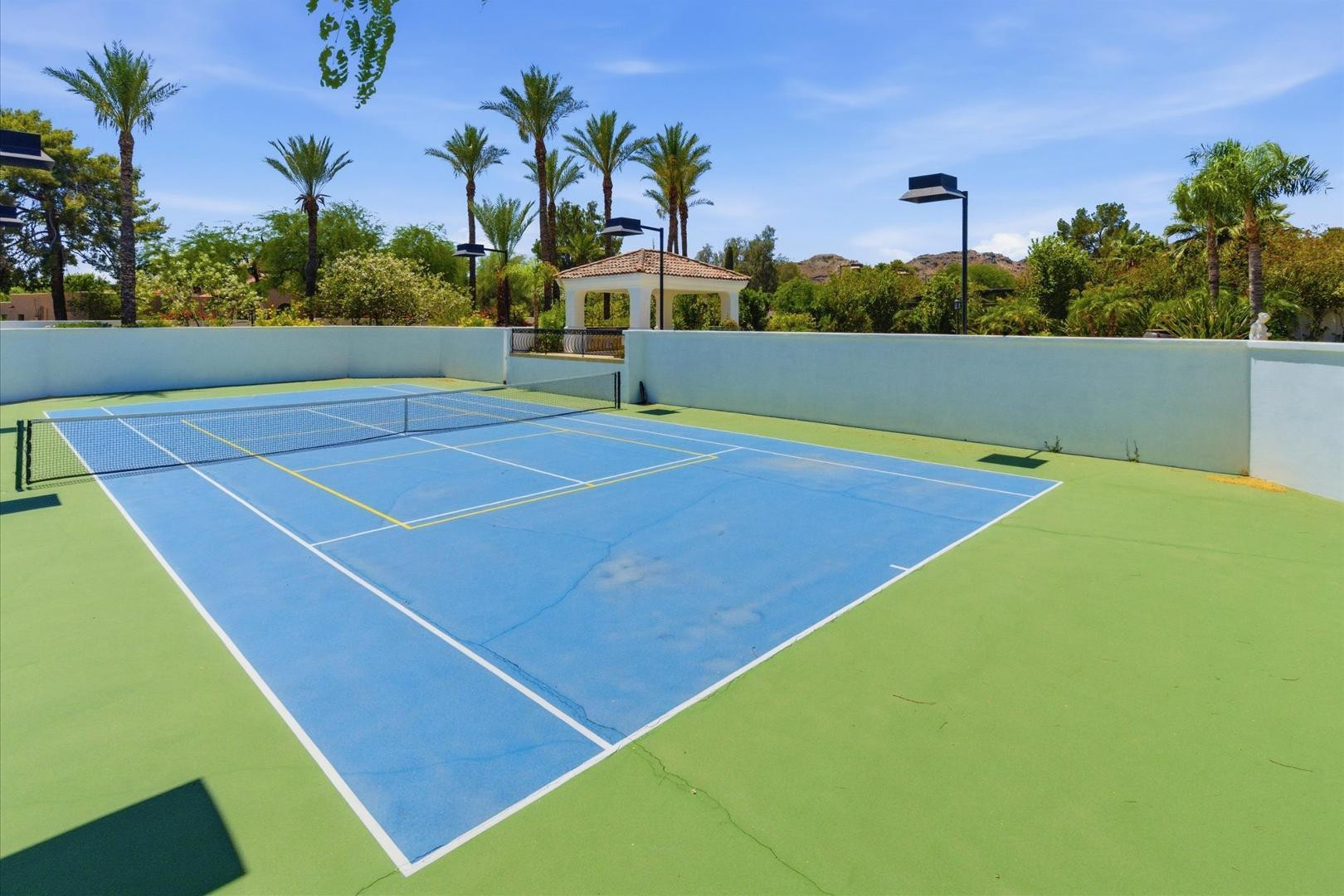 6997 East Paradise Ranch Road Paradise Valley, AZ 85253 - Photo 17 of 17 a view of a tennis court