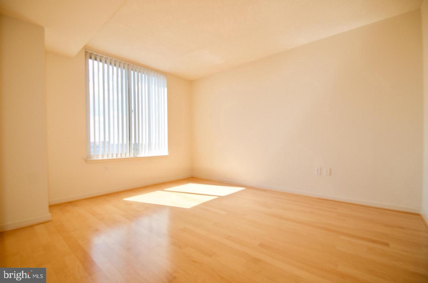 2726 Gallows Road, Unit 917 Vienna, VA 22180 - Photo 11 of 25 a view of an empty room with a window