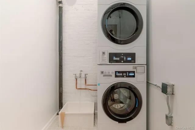 a utility room with dryer and washer