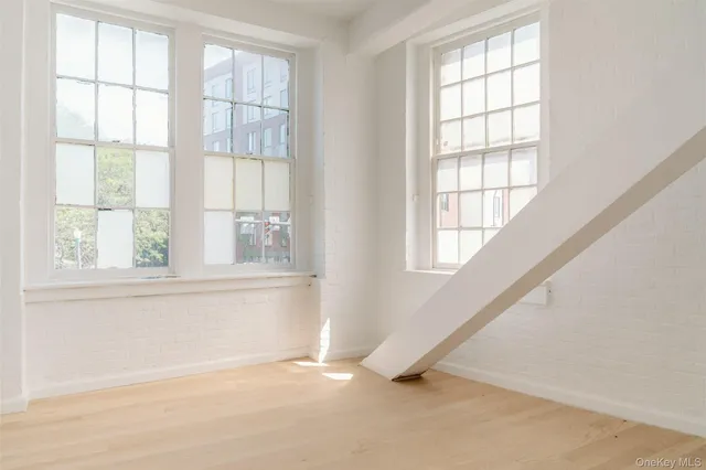 an empty room with windows