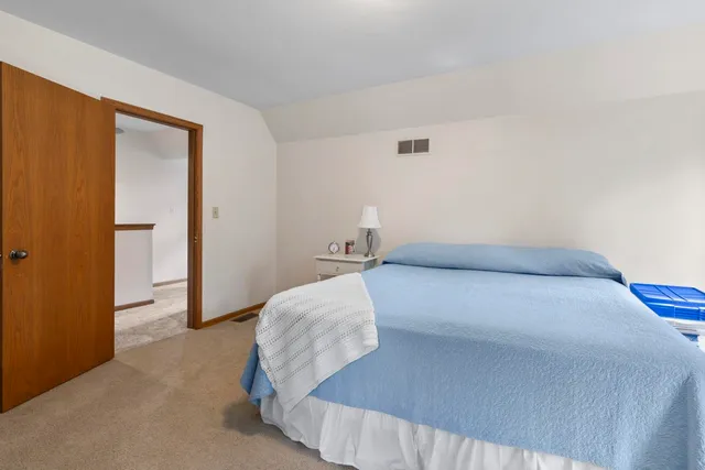 a bathroom with a double vanity sink double and mirror
