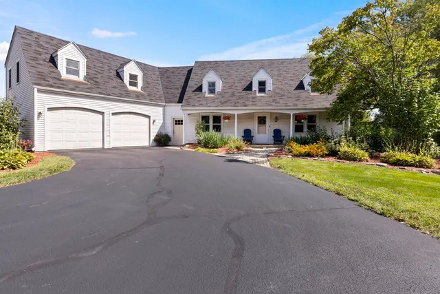 a view of a lake with a yard