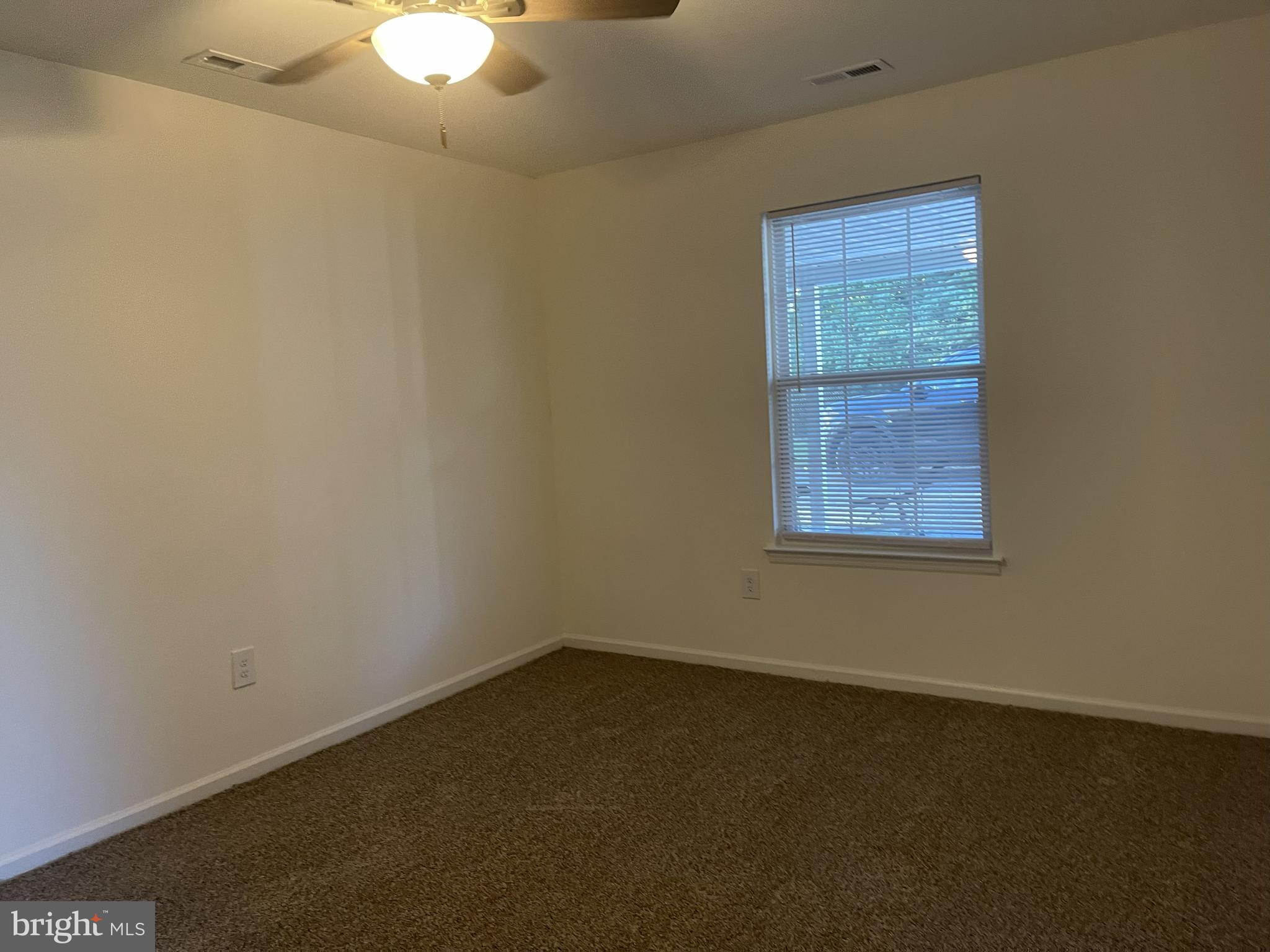 126-128 South Main Street, Unit B Glassboro, NJ 08028 - Photo 5 of 8 an empty room with a window