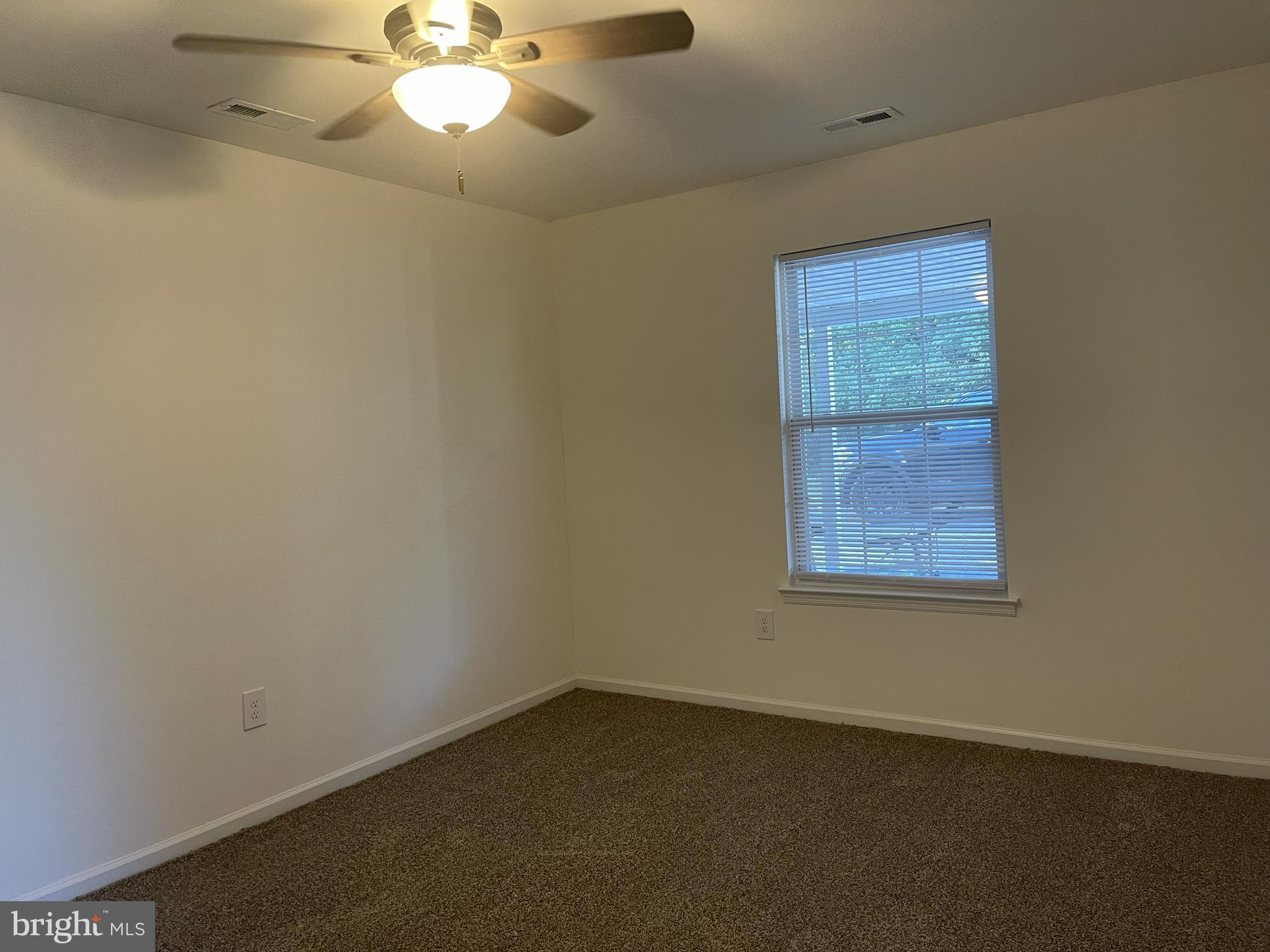 126-128 South Main Street, Unit B Glassboro, NJ 08028 - Photo 6 of 8 an empty room with a window