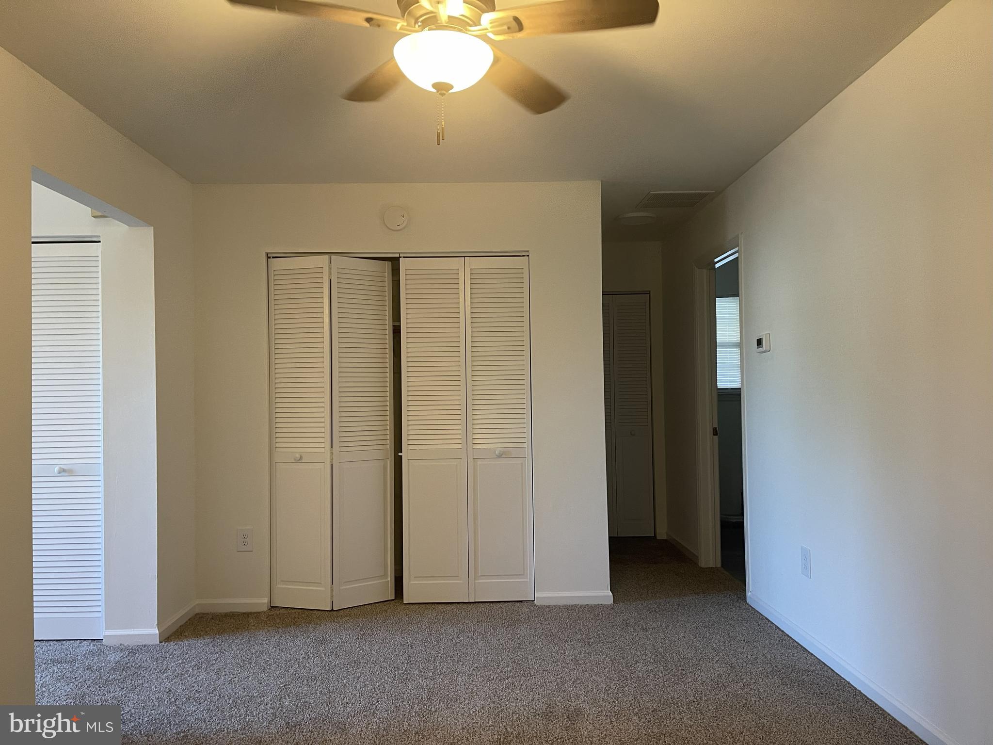 126-128 South Main Street, Unit B Glassboro, NJ 08028 - Photo 7 of 8 an empty room with chandelier fan