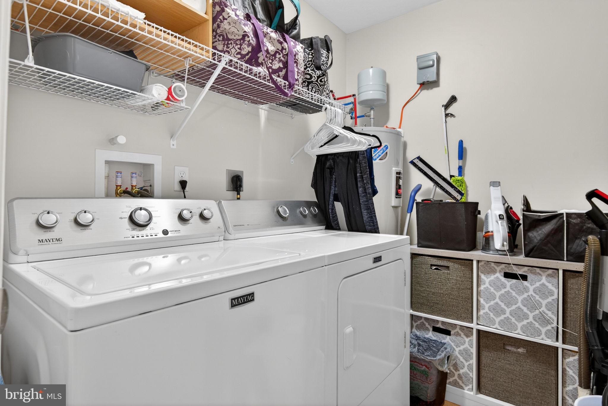 1332 Pleasant View Drive, Unit 75 Spring Grove, PA 17362 - Photo 16 of 26 a utility room with dryer and washer