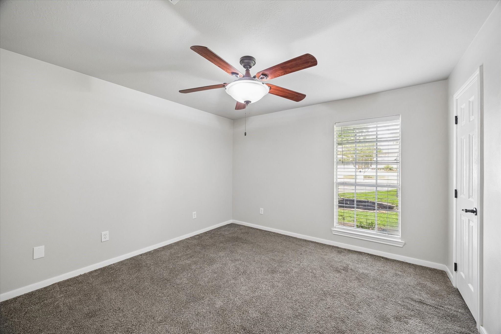 109 Dawns Edge Conroe, TX 77356 - Photo 15 of 24 a view of an empty room with a window