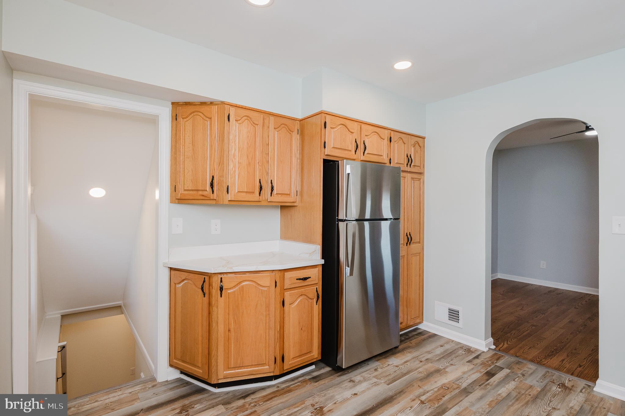 8029 Neighbors Avenue Rosedale, MD 21237 - Photo 24 of 42 STAIRS TO LOWER LEVEL FROM KITCHEN