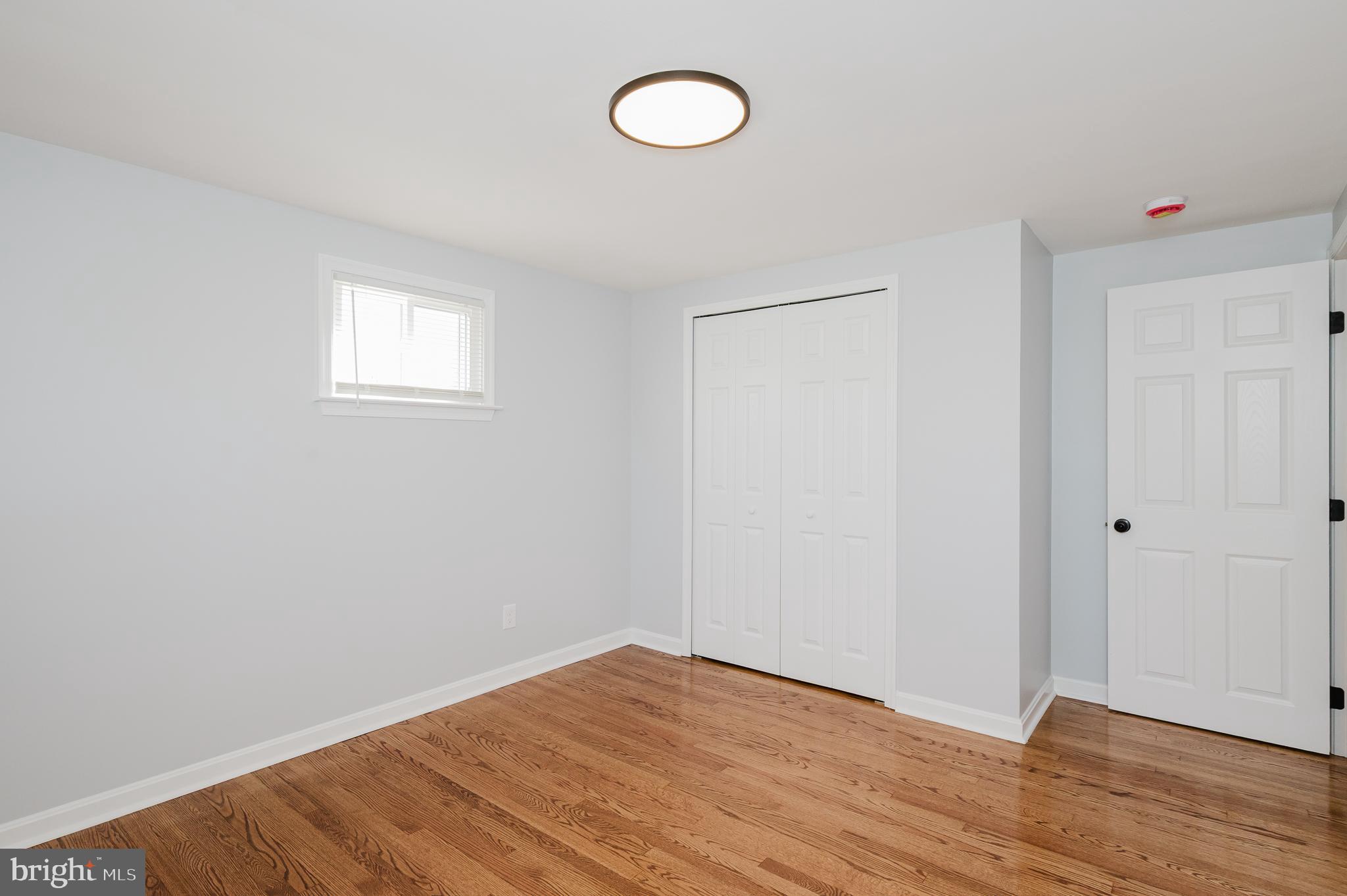 8029 Neighbors Avenue Rosedale, MD 21237 - Photo 29 of 42 BEDROOM TWO/ ALL FRESHLY PAINTED