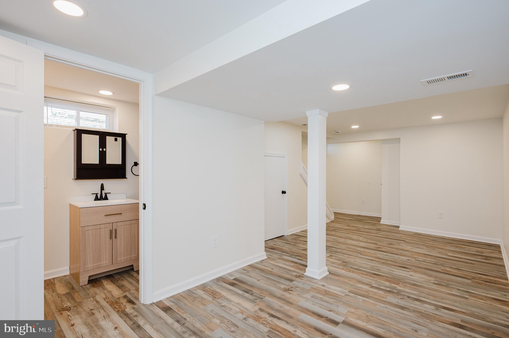 8029 Neighbors Avenue Rosedale, MD 21237 - Photo 35 of 42 LUXURY VINYL PLANK FLOORING