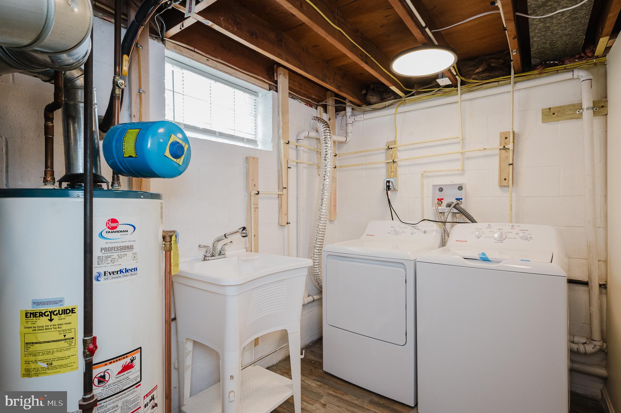 8029 Neighbors Avenue Rosedale, MD 21237 - Photo 42 of 42 LAUNDRY ROOM WITH NEW WASHER/DRYER