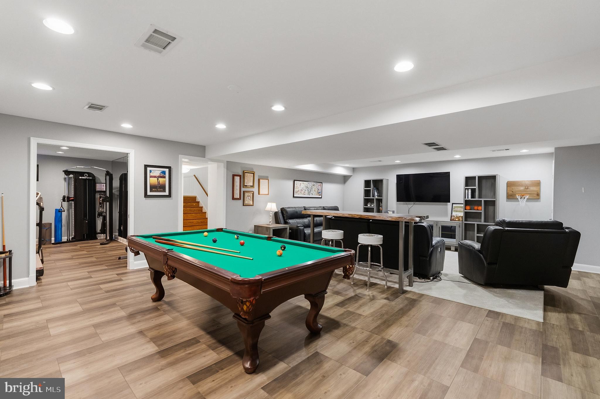 6302 Long Meadow Road McLean, VA 22101 - Photo 32 of 39 RECREATION ROOM adjacent to FITNESS ROOM/GYM