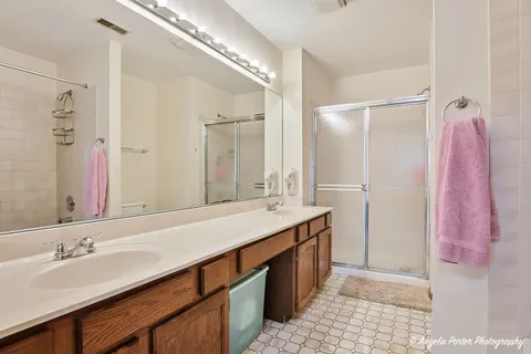 a bedroom that has a bed and a window in it