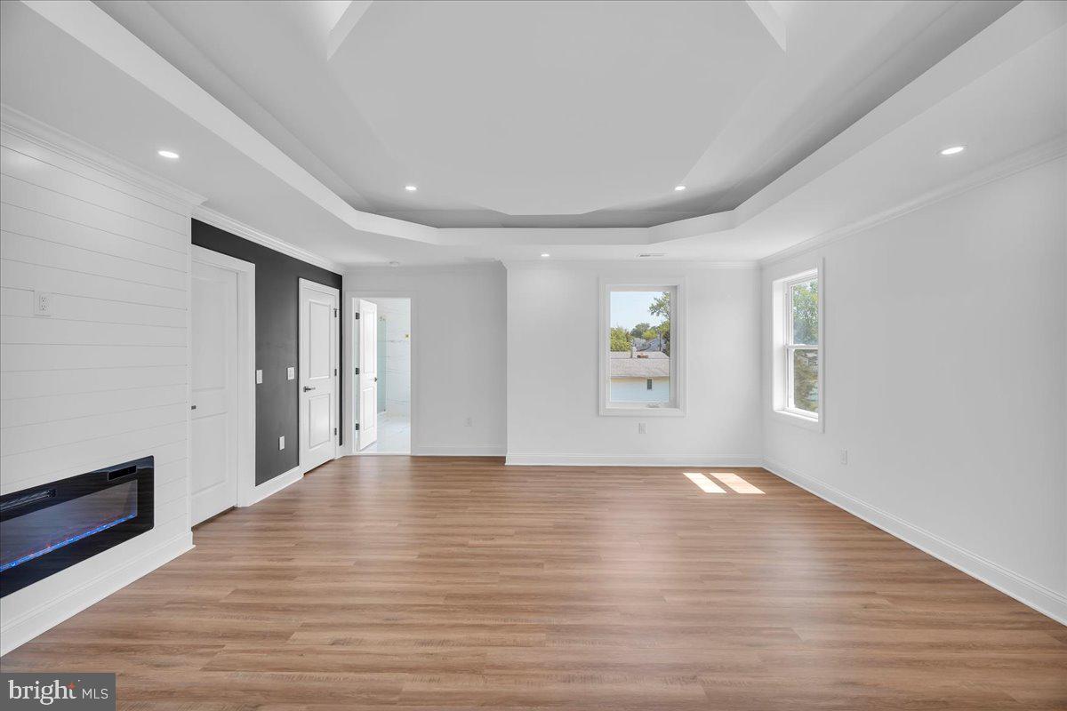 2504 Church Road Cinnaminson, NJ 08077 - Photo 29 of 79 a view of an empty room with wooden floor and a window